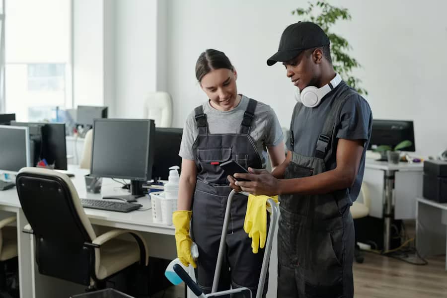 Janitors coordinating cleaning setup for an event venue